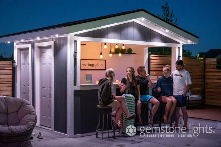 Permanent outdoor LED lighting installed by Emerald Coast Illumination on a backyard bar structure