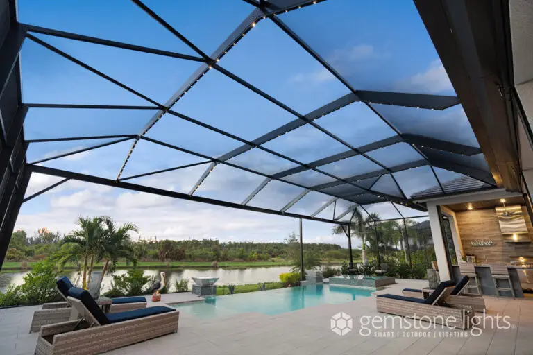 Permanent LED lighting on a screened pool enclosure with warm ambient tones