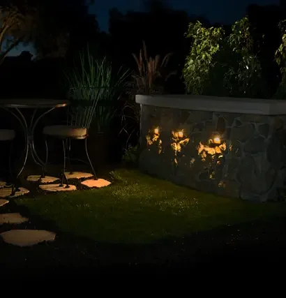 App-controlled dimming for outdoor lighting in residential backyard