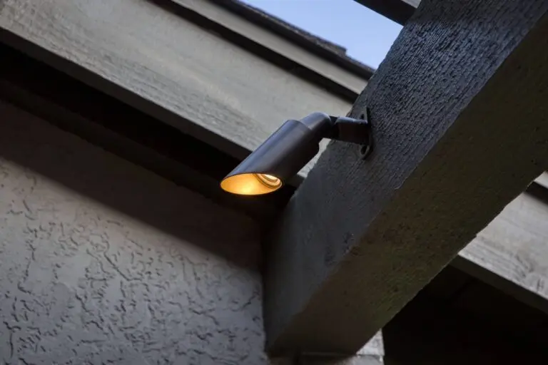 Sleek directional down light mounted on outdoor beam for focused illumination